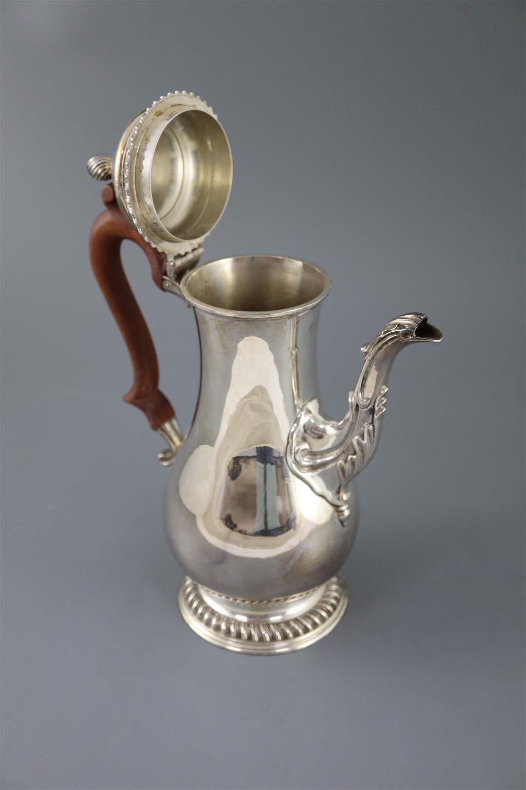 A modern 18th century style silver baluster coffee pot, by Spink & Son, gross 36oz.